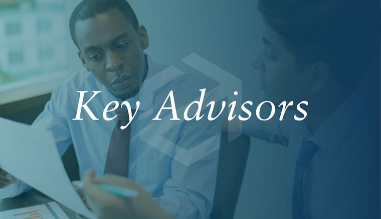 key advisors reviewing financial data
